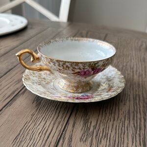 Elegant Gold and Floral Teacup and Saucer Set